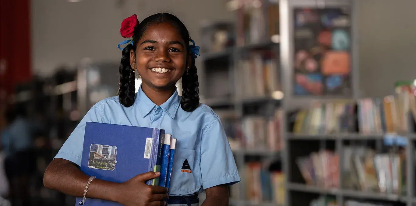 community outreach by embassy group - girl ready to go to school desktop