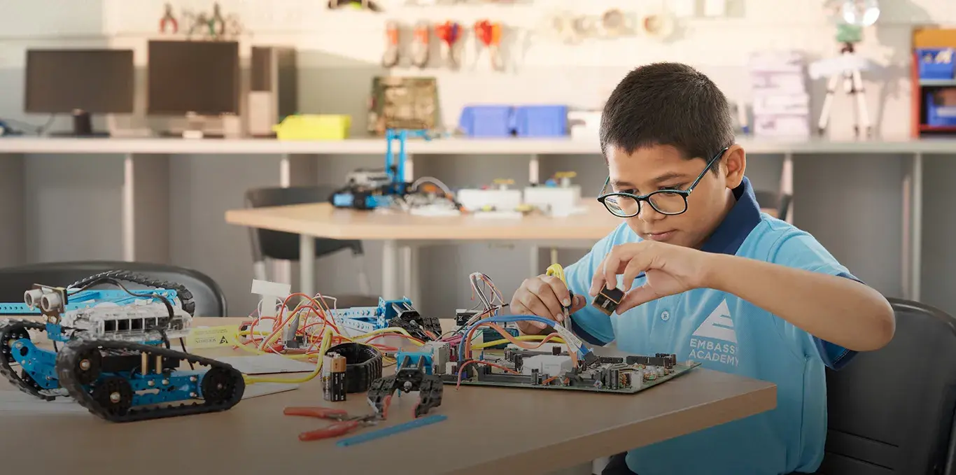 Student works on Physics Experiment