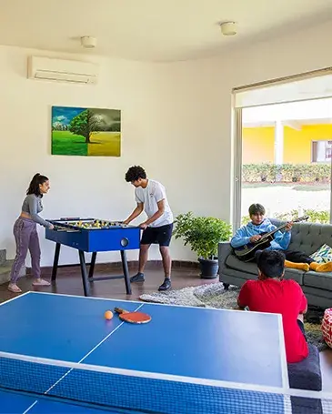 Students Playing Foosball