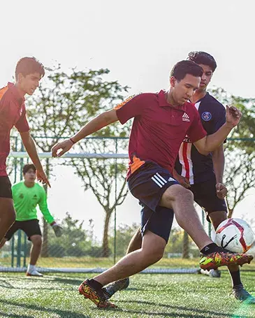Students Playing Football