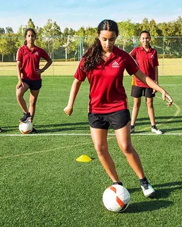 Students Playing Football