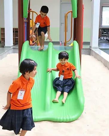 Students playing on Slides